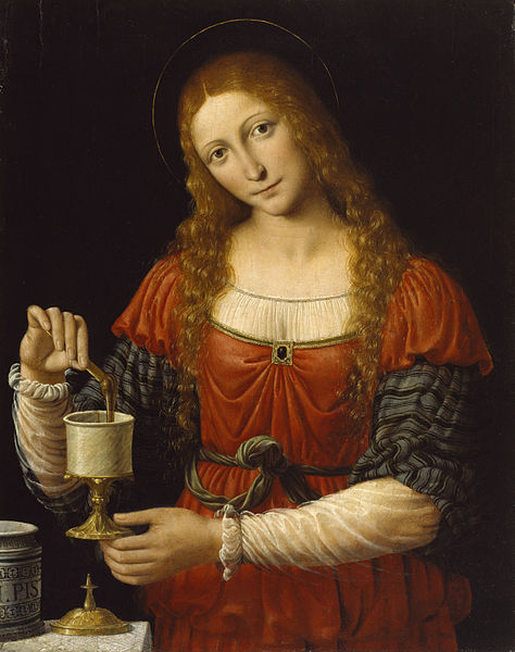 Renaissance-era oil painting depicting Mary Magdalene holding a golden-stemmed cup