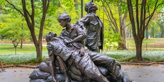 Sculpture showing three military women