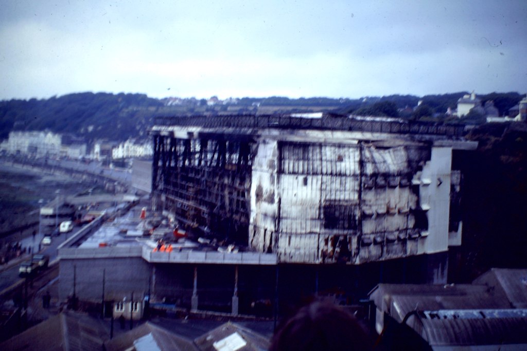 Photograph taken from a distance of the burnt-out remains of the Summerland complex, after it was destroyed by a fire in August 1973