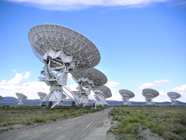 Large white radio antennae of the Very Large Array in Socorro County, New Mexico